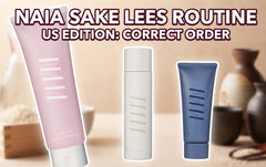 Six NAIA skincare products from Japan laid out left to right in routine order: aqua cleansing gel, charcoal cleansing foam, sake lees essence lotion, rice bran serum emulsion, rice bandage cream and a sheet mask.